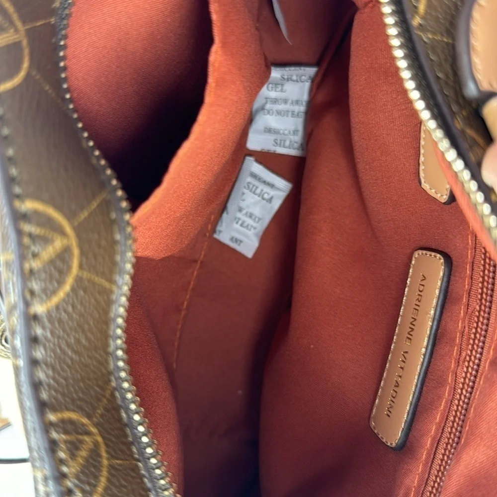 Adrienne Vittadini brown logo tassel crossbody bag